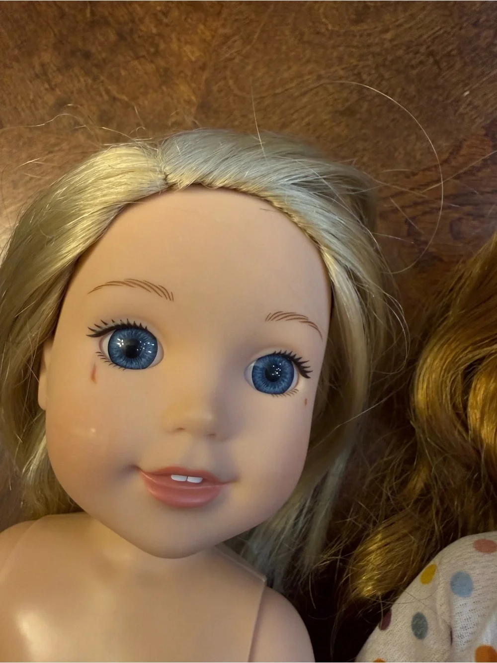 3 American girl-wellie wisher dolls.